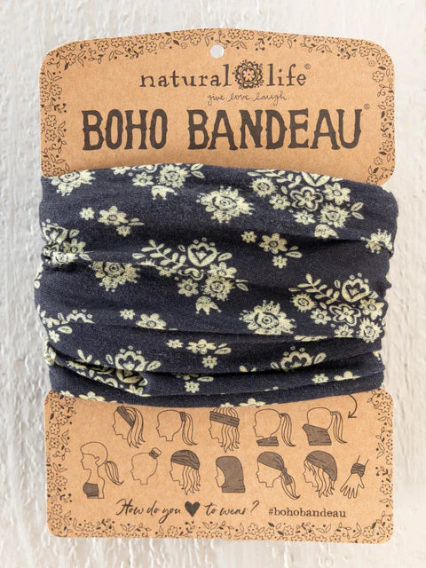 Boho bandeau with floral pattern on a cardboard backing with 'natural life' branding.