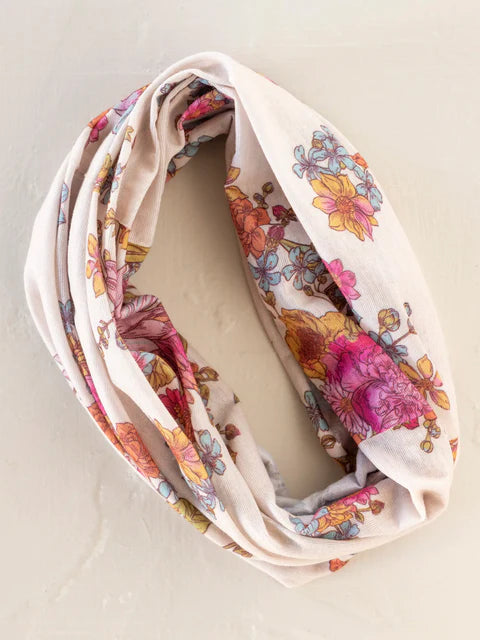 Floral patterned infinity scarf on a light background