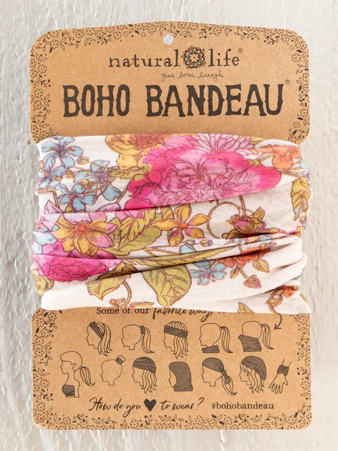 Floral bandeau top with 'Boho Bandeau' packaging on a beige background