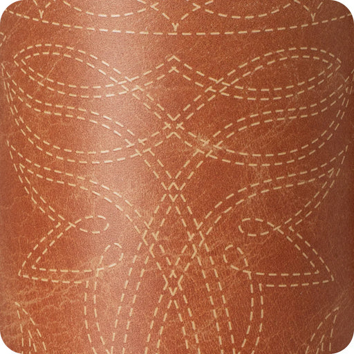 Close-up of brown leather with white stitching pattern