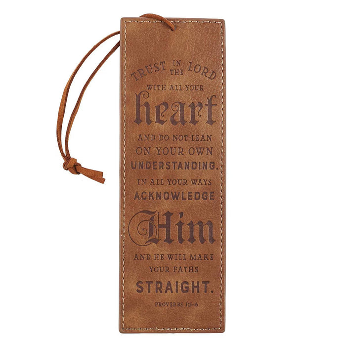 Brown leather bookmark with engraved text on a white background