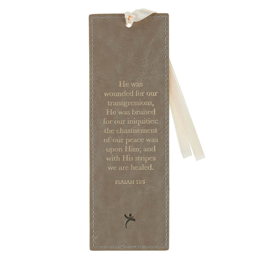 Brown leather bookmark with engraved text on a white background
