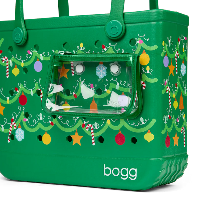 Green bogg bag with Christmas tree design and clear front pocket on a white background