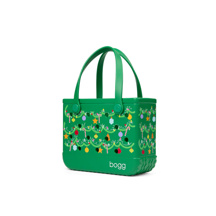 Green handbag with festive design and 'bogg' branding on a white background