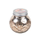Decorative glass jar with metallic finish and silver lid on a white background
