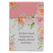 Floral book with text on a pink and white background