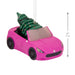 Pink toy car with a green Christmas tree inside, on a white background