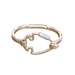Gold bracelet on a white background