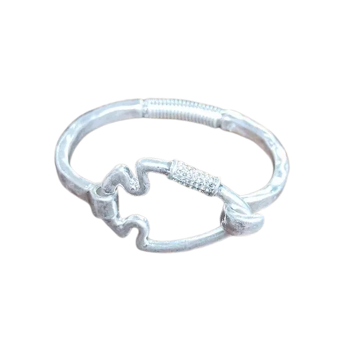 Silver ring with star design on a white background