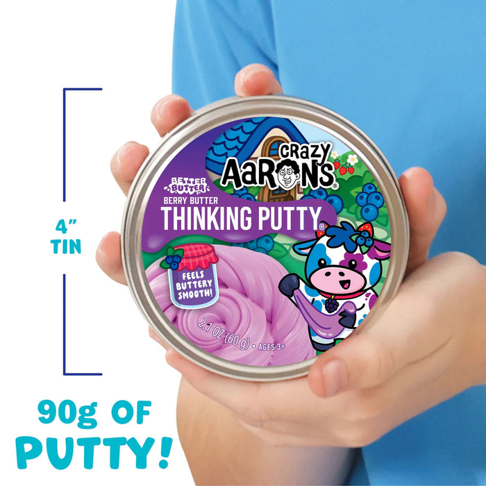 Crazy Aaron's Thinking Putty container held by a person with product details on a blue background