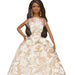 Barbie doll in a beige and white patterned gown on a white background