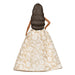 Doll wearing a beige floral dress on a white background