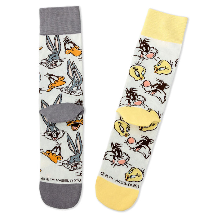 Two socks with cartoon character design on a white background