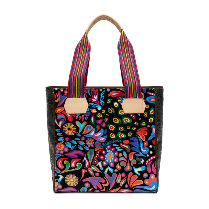 Colorful tote bag with abstract floral design on a white background