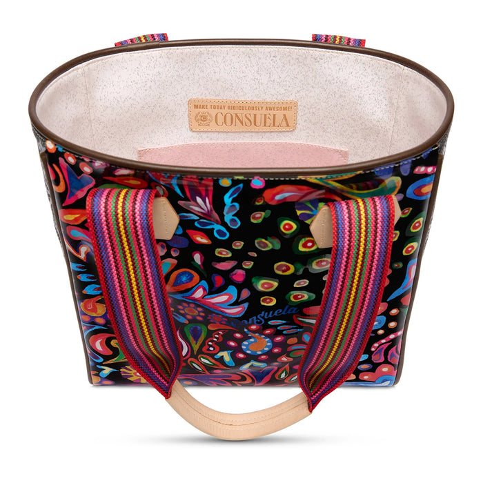 Colorful handbag with a pattern and visible brand name on a white background