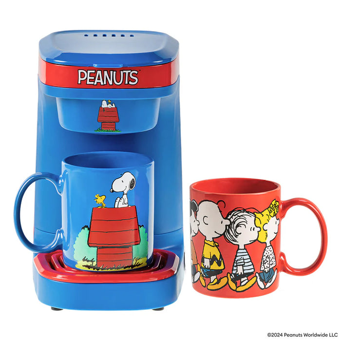 Peanuts-themed coffee maker and mugs on a white background