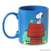 Blue mug with Snoopy and Woodstock design on a white background