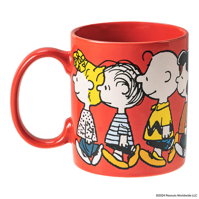 Red mug with Peanuts character illustrations on a white background