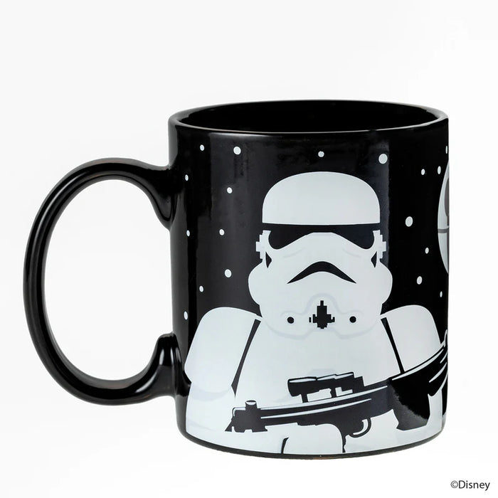 Black mug with a white stormtrooper design on a white background