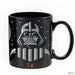 Black mug with Darth Vader design on a white background