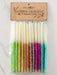 Packaged set of colorful wishing candles with 'natural life' branding on a light background