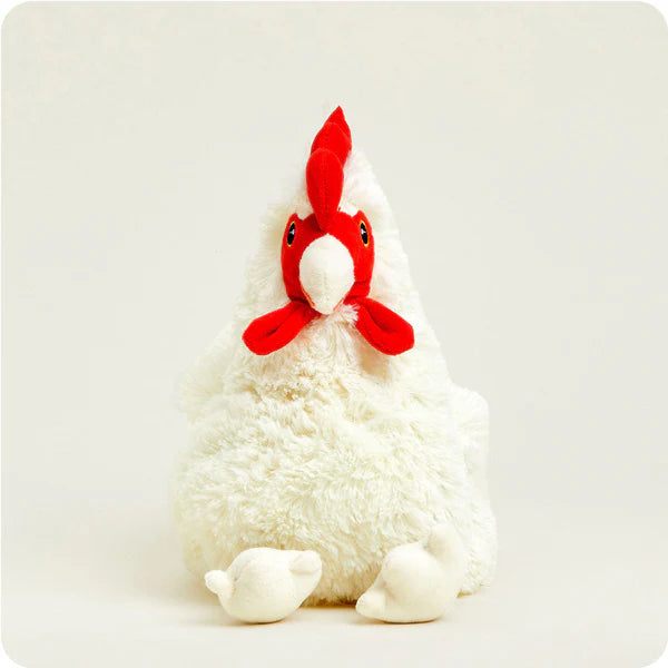 White plush chicken toy with a red comb on a light gray background
