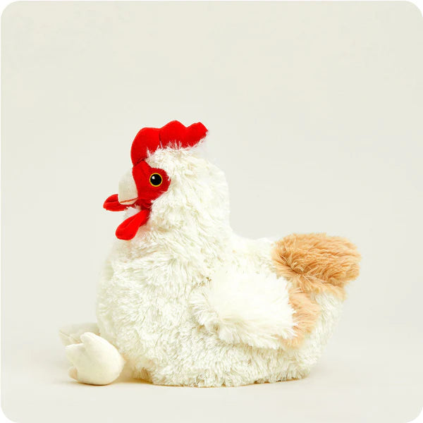 Plush toy rooster with a red comb on a white background