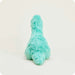 Turquoise plush toy on a white background