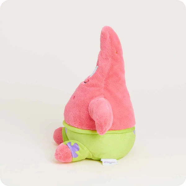 Plush toy resembling a pink creature with a green body on a white background
