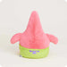 Pink and green plush toy with a purple bow on a white background