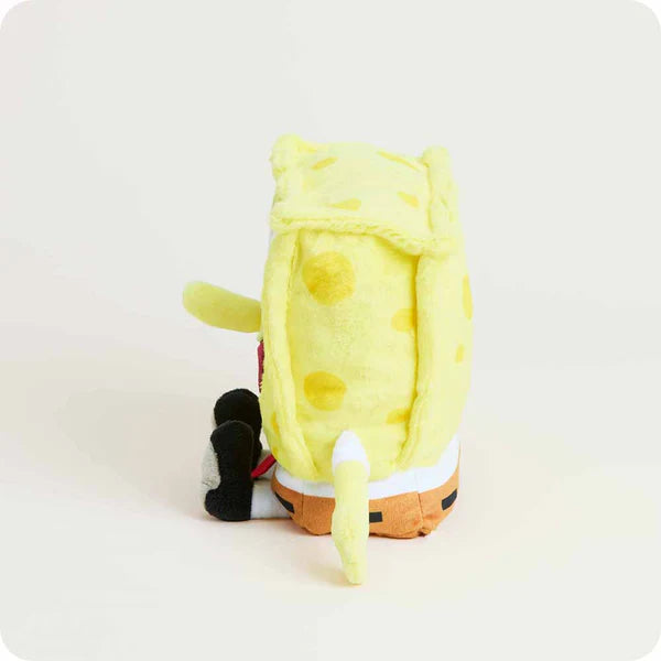 Plush toy resembling a yellow character with a white shirt and black pants on a white background