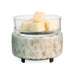 Ceramic wax warmer with glass lid on a white background