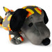 A plush dog toy in dark gray with black ears and nose, decorated with candy corn patterns in yellow, orange, and white.