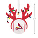 A Cardinals-themed Christmas ornament shaped like a baseball with red antlers and hanging string lights, shown on a white background with a 4.5-inch size marker.