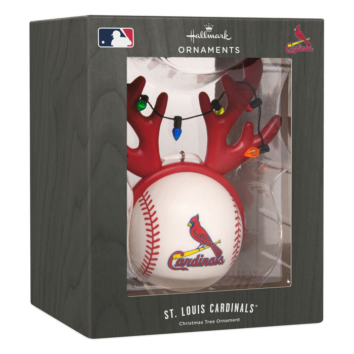 St. Louis Cardinals Christmas tree ornament in its retail packaging, featuring a white baseball with the Cardinals logo and red antler branches decorated with multicolored holiday lights.