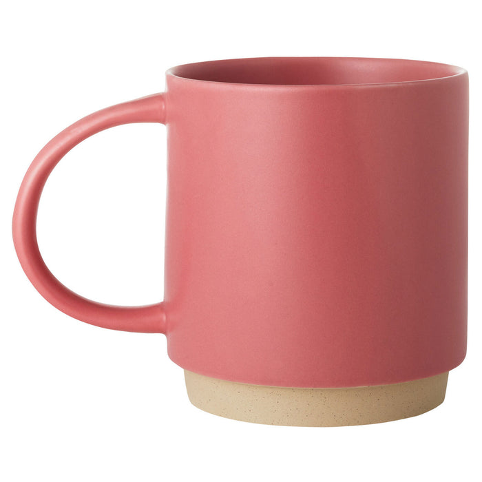 Pink mug with a beige base on a white background