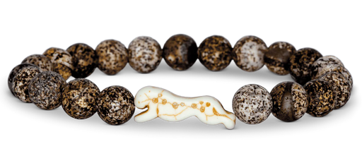 Bracelet with brown beaded design and a white and gold cat figure on a white background