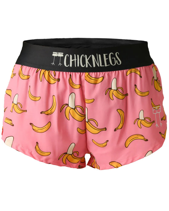 Pink shorts with banana pattern and black waistband with 'CHICKNLEGS' text on a white background