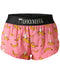 Pink shorts with banana pattern and black waistband with 'CHICKNLEGS' text on a white background