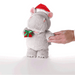 Plush hippo toy wearing a Santa hat and holding a gift box on a white background
