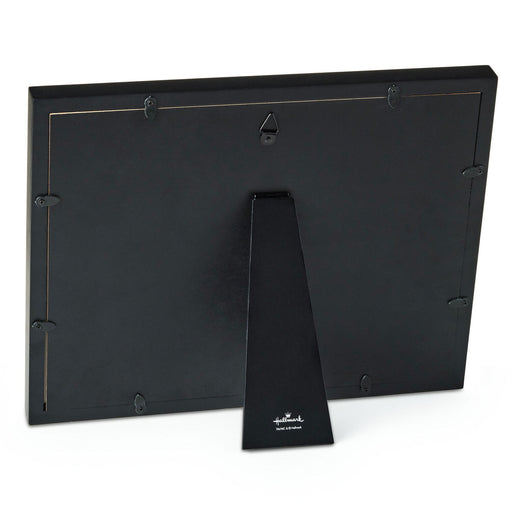 Black picture frame with a stand on a white background