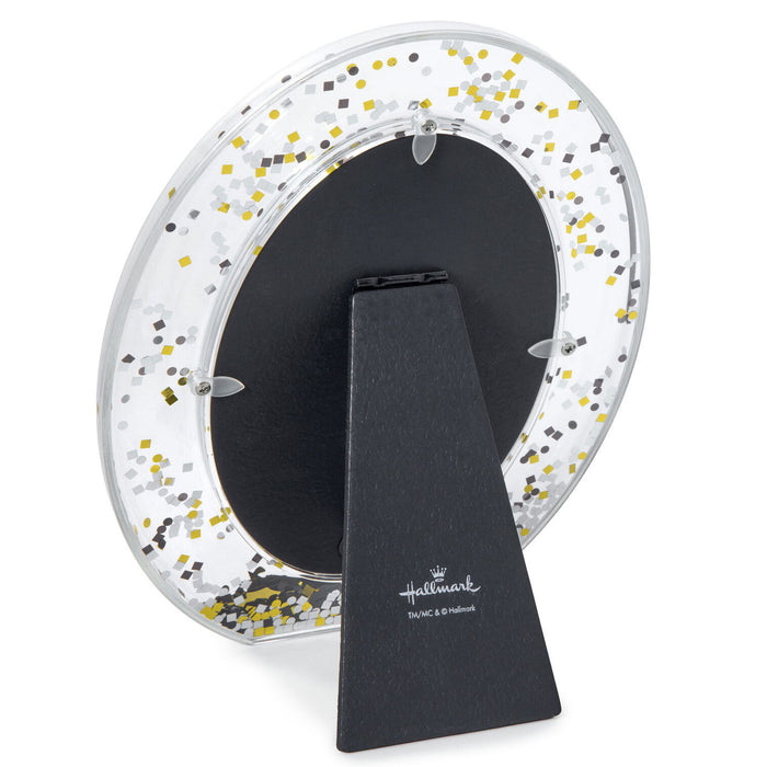 Decorative photo frame with confetti design on a white background