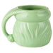 Green ceramic mug with a textured surface on a white background