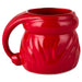 Red ceramic mug with a unique design on a white background
