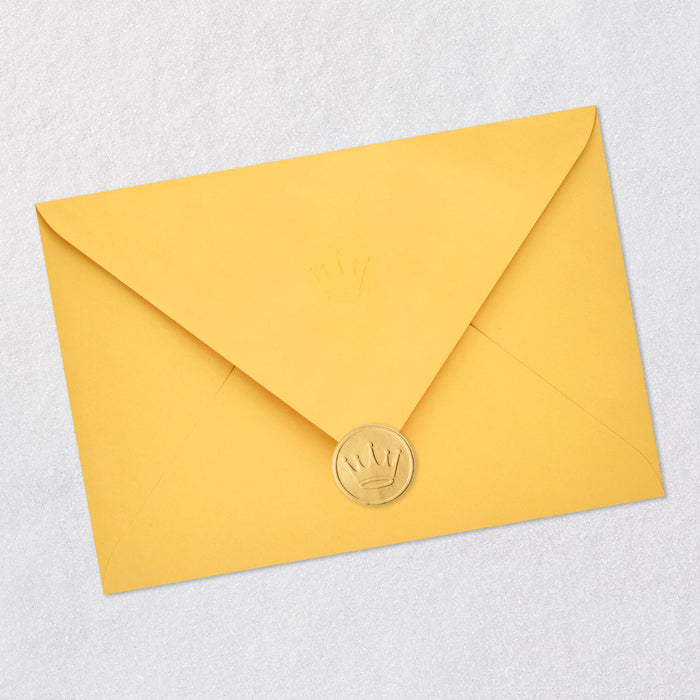 Yellow envelope with a gold seal on a light gray background