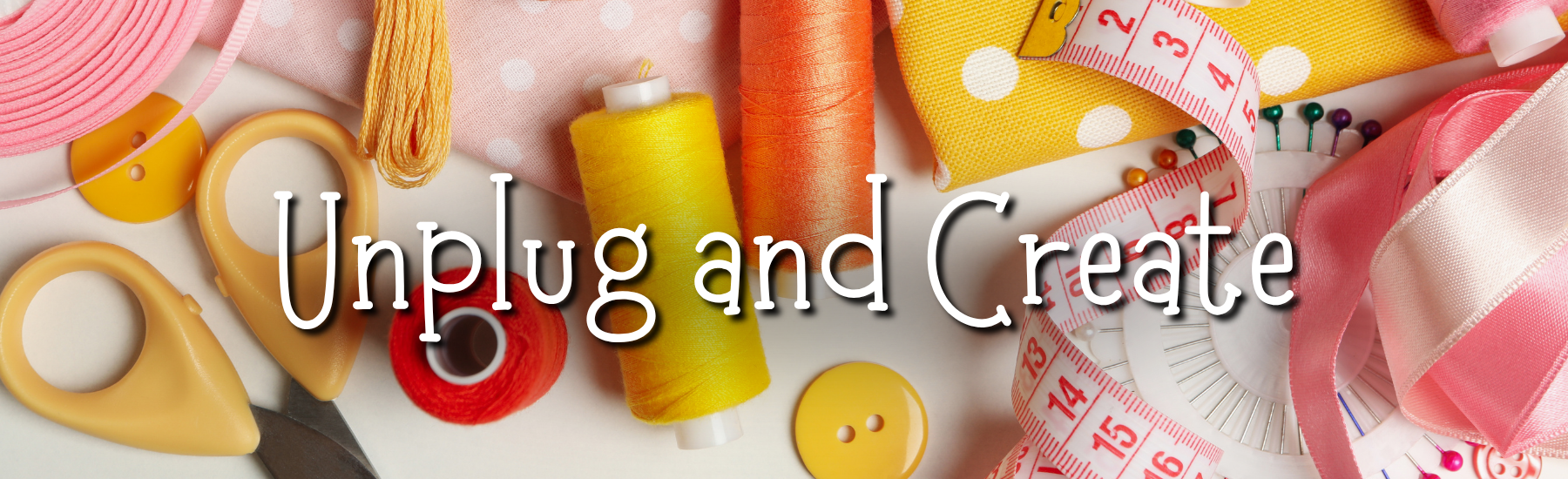 A styled flat-lay of sewing and crafting supplies including scissors, thread spools, measuring tape, buttons, and ribbon on a white surface, with the text 'Unplug and Create' overlaid across the center.