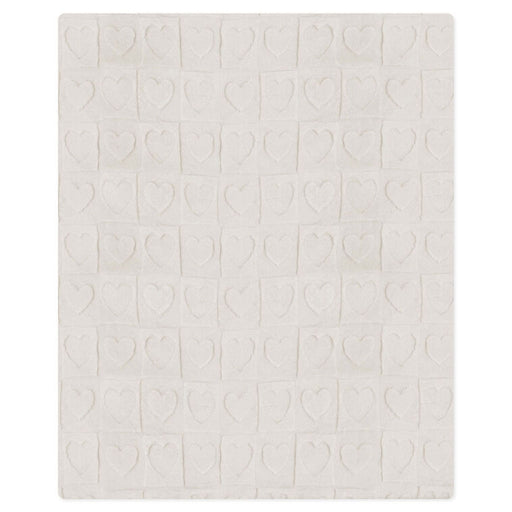 Textured white fabric with a subtle pattern on a white background