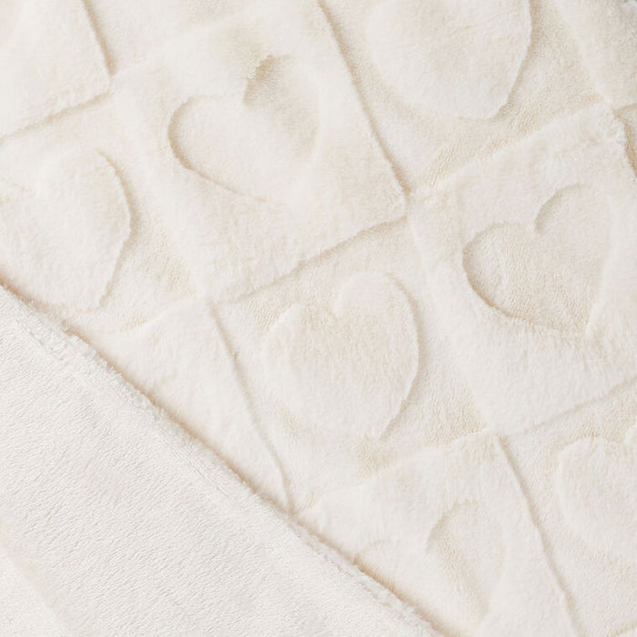 Close-up of a textured white fabric surface