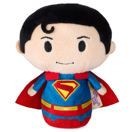 Superman plush toy with red cape and blue suit on a white background