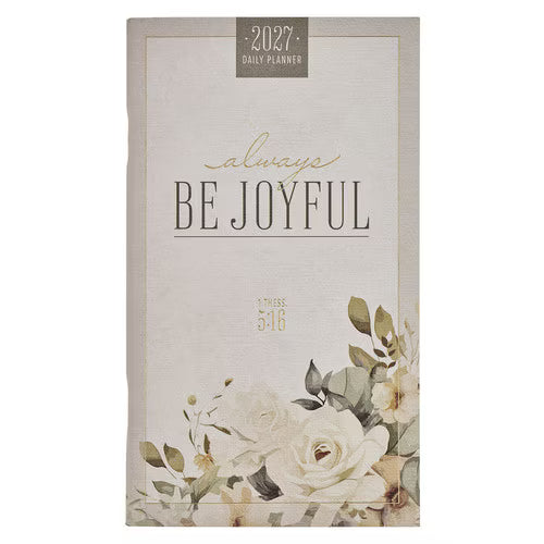 A vertical daily planner with a textured cream cover, featuring the words 'always BE JOYFUL' in elegant typography, a '2027 DAILY PLANNER' label at the top, and a floral illustration in soft cream, white, and muted green tones near the bottom.
